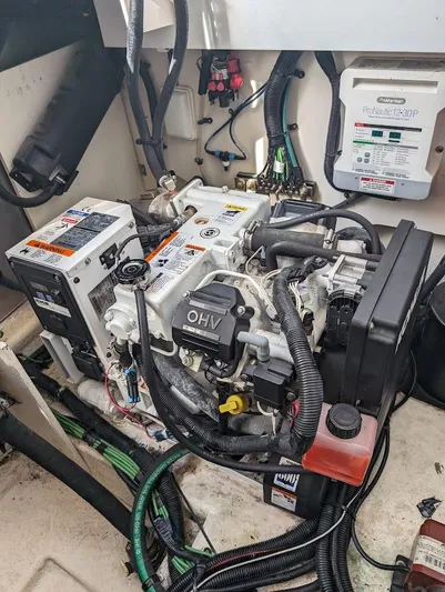 So Lucky Yacht Photos Pics Engine compartment of a 2015 Sea Ray 330 Sundancer boat.