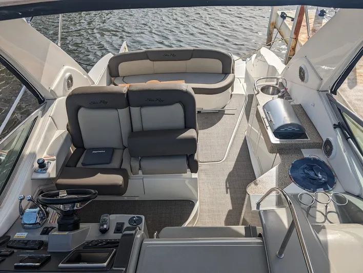 So Lucky Yacht Photos Pics 2015 Sea Ray 330 Sundancer boat interior with seating and kitchenette.