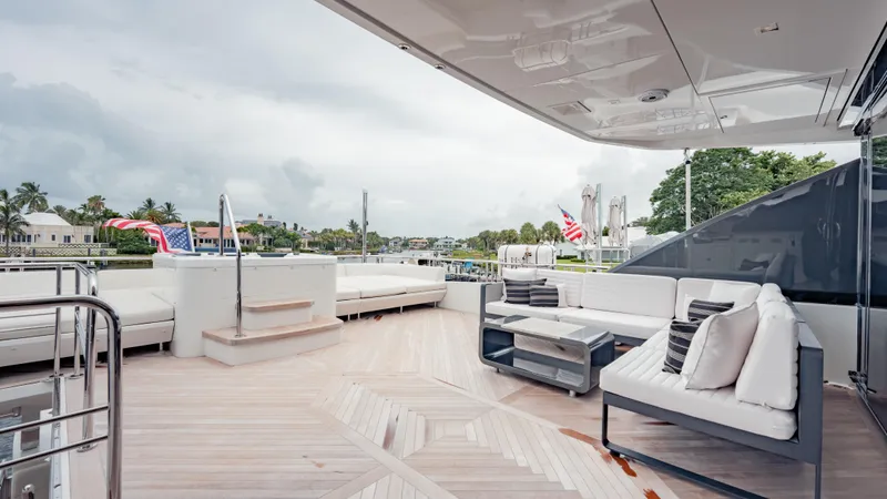Pinch Me Yacht Photos Pics Luxurious deck of 2021 Ocean Alexander 28R yacht with elegant seating and scenic view.