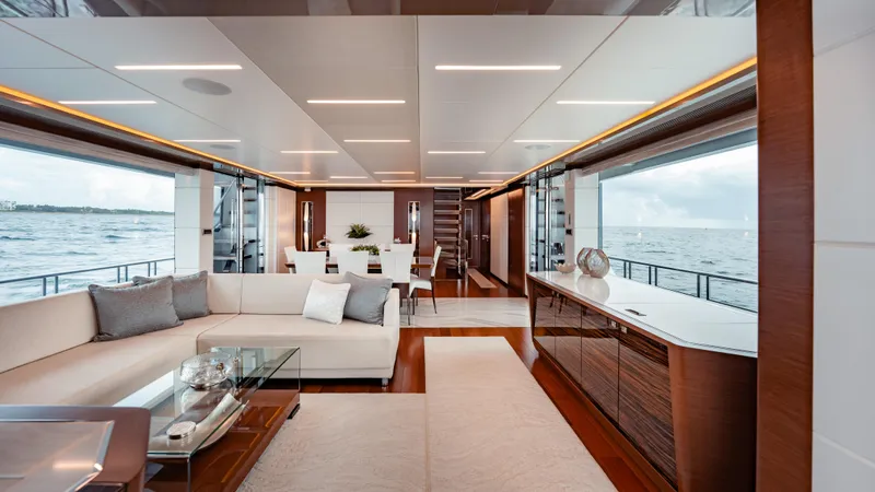 Pinch Me Yacht Photos Pics Luxurious interior of 2021 Ocean Alexander 28R yacht with elegant furnishings and ocean view.
