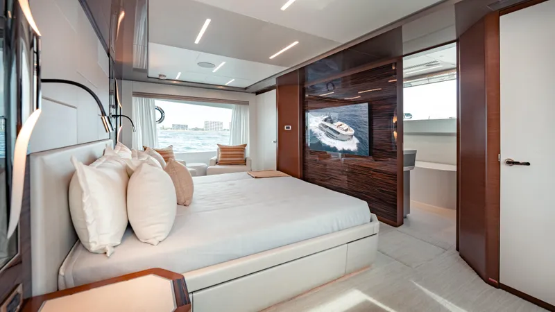 Pinch Me Yacht Photos Pics Luxurious bedroom interior of 2021 Ocean Alexander 28R yacht with modern design and ocean view.