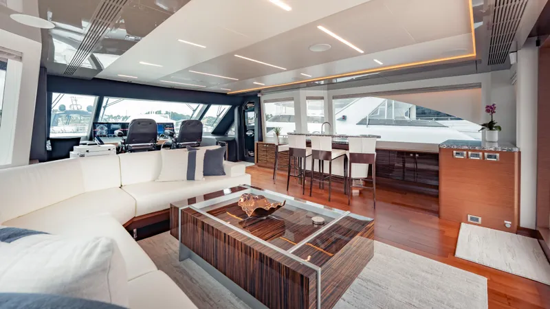 Pinch Me Yacht Photos Pics Luxurious interior of 2021 Ocean Alexander 28R yacht with modern seating and elegant decor.