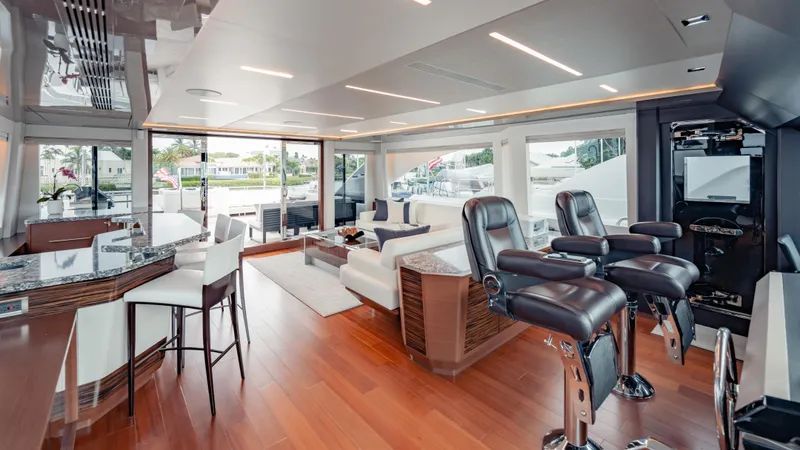Pinch Me Yacht Photos Pics Luxurious interior of 2021 Ocean Alexander 28R yacht with modern seating and elegant design.