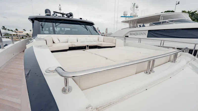 Pinch Me Yacht Photos Pics Luxurious 2021 Ocean Alexander 28R yacht with spacious deck and elegant seating area.