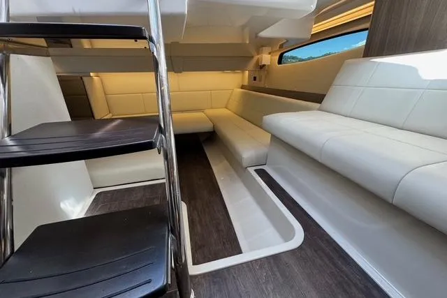  Yacht Photos Pics Interior of 2021 Regal 36 Grande Coupe with modern seating and sleek design.