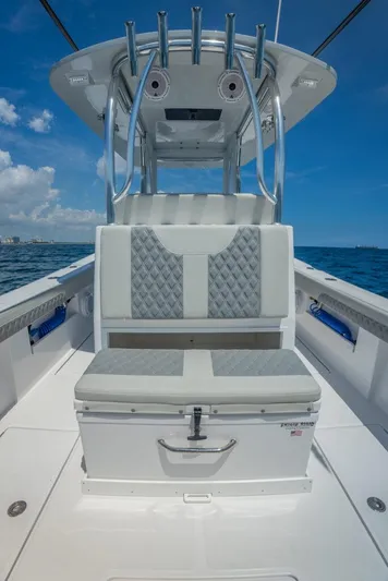  Yacht Photos Pics 2026 Front Runner 33 Center Console boat interior with seating and ocean view.