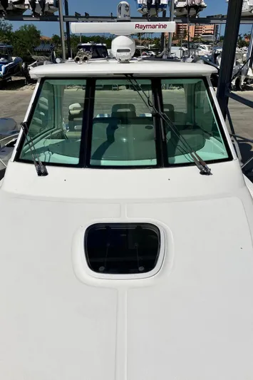  Yacht Photos Pics 2009 Boston Whaler 345 Conquest boat with windshield and Raymarine equipment.