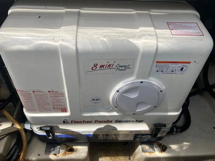  Yacht Photos Pics Fischer Panda Generator in 2009 Boston Whaler 345 Conquest boat, compact power unit.