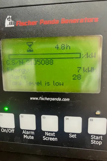  Yacht Photos Pics Fischer Panda generator display showing power usage and low tank level alert. Boston Whaler 345 Conquest 2009.