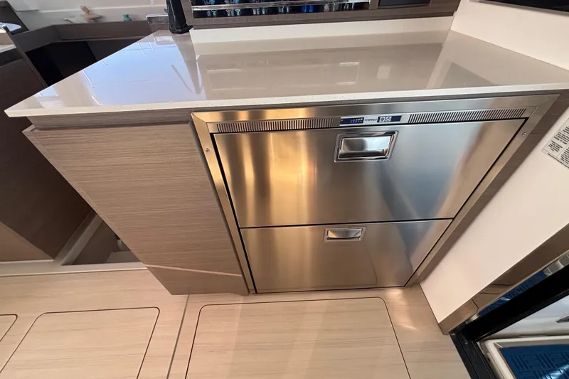  Yacht Photos Pics Modern kitchen area on 2022 Leopard 42 yacht with stainless steel appliances.