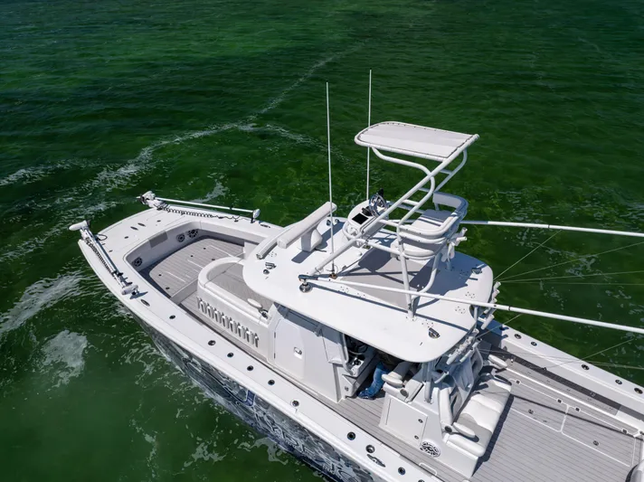  Yacht Photos Pics 2023 Freeman 37 VH boat cruising on clear green water.