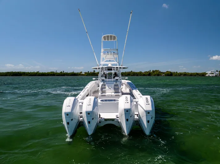  Yacht Photos Pics 2023 Freeman 37 VH boat with four engines on open water.