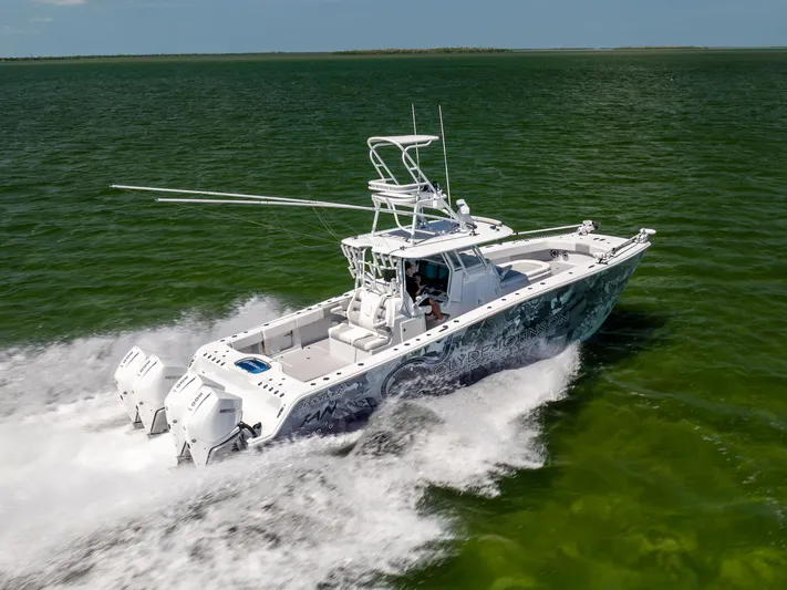  Yacht Photos Pics 2023 Freeman 37 VH boat cruising on open water, showcasing powerful twin engines.