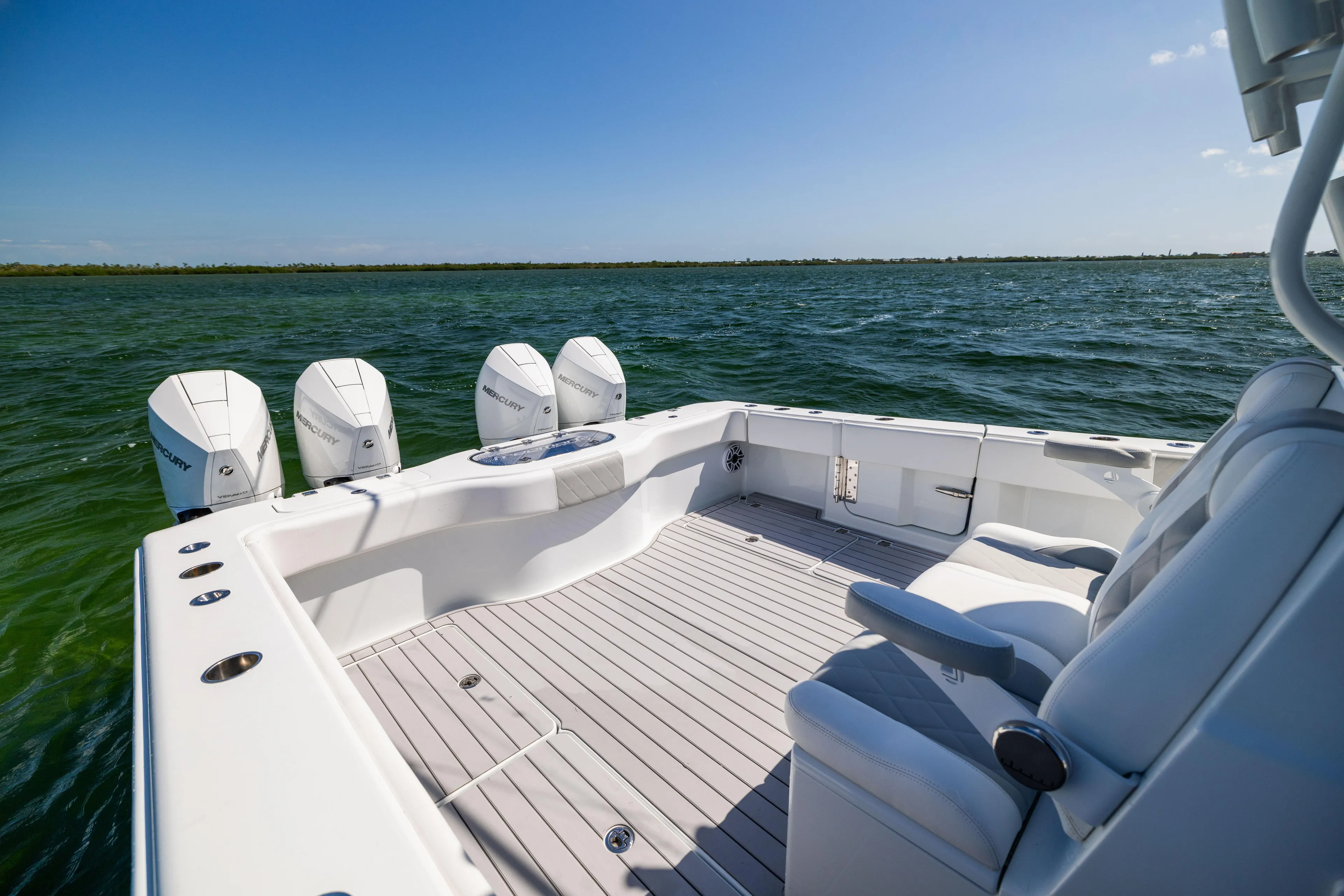  Yacht Photos Pics Freeman 37 VH 2023 boat with four engines on open water.