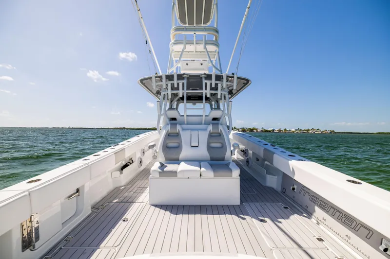  Yacht Photos Pics Freeman 37 VH 2023 boat interior with seating, on open water under clear sky.