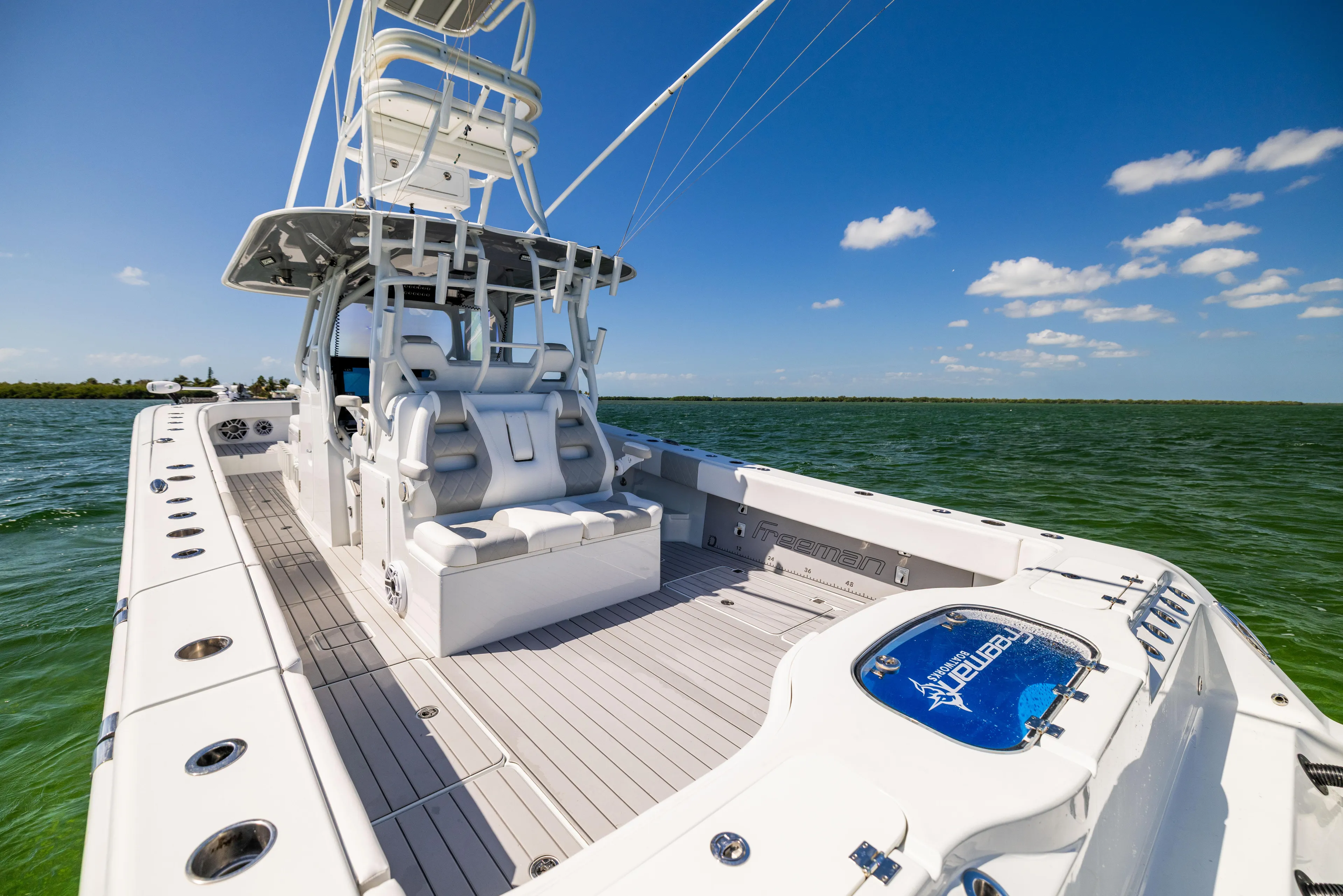  Yacht Photos Pics 2023 Freeman 37 VH boat on open water, featuring spacious deck and modern design.