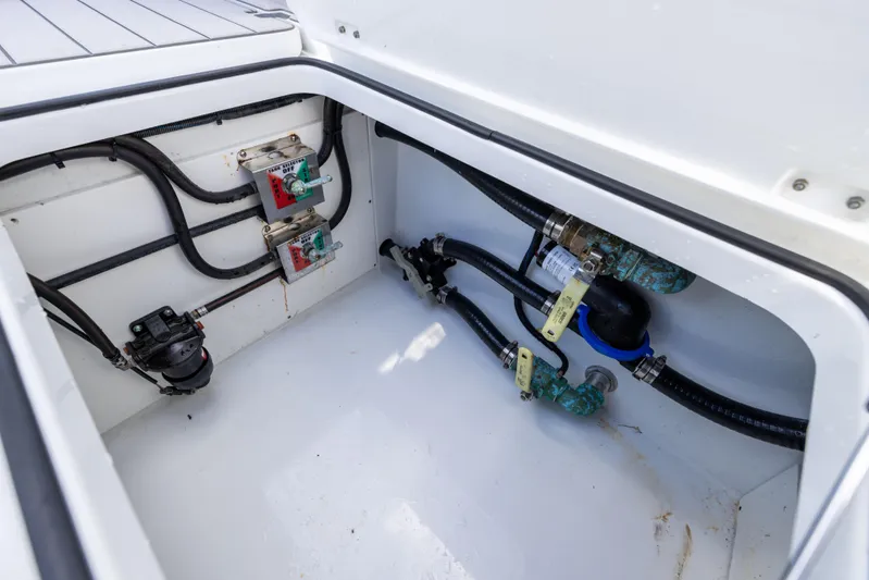  Yacht Photos Pics Freeman 37 VH 2023 boat compartment with wiring and plumbing components.