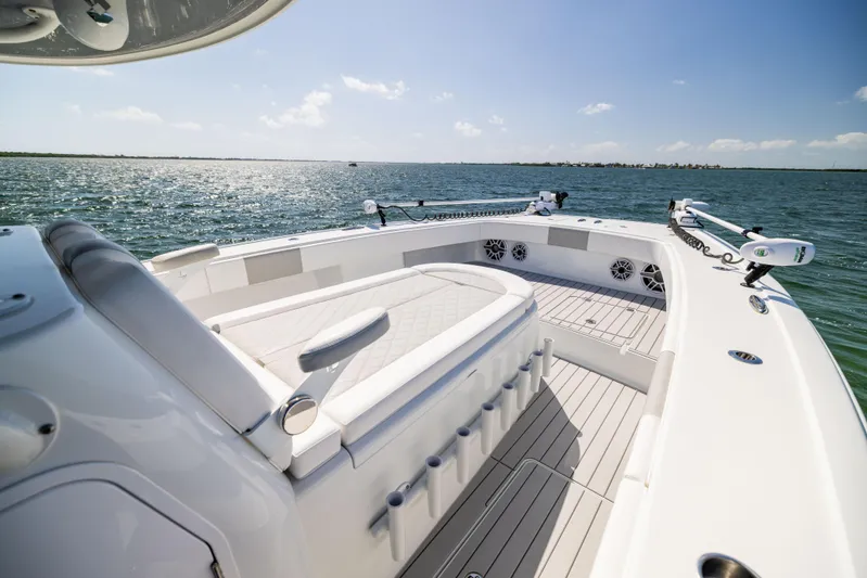  Yacht Photos Pics 2023 Freeman 37 VH boat interior with seating, on a sunny day at sea.