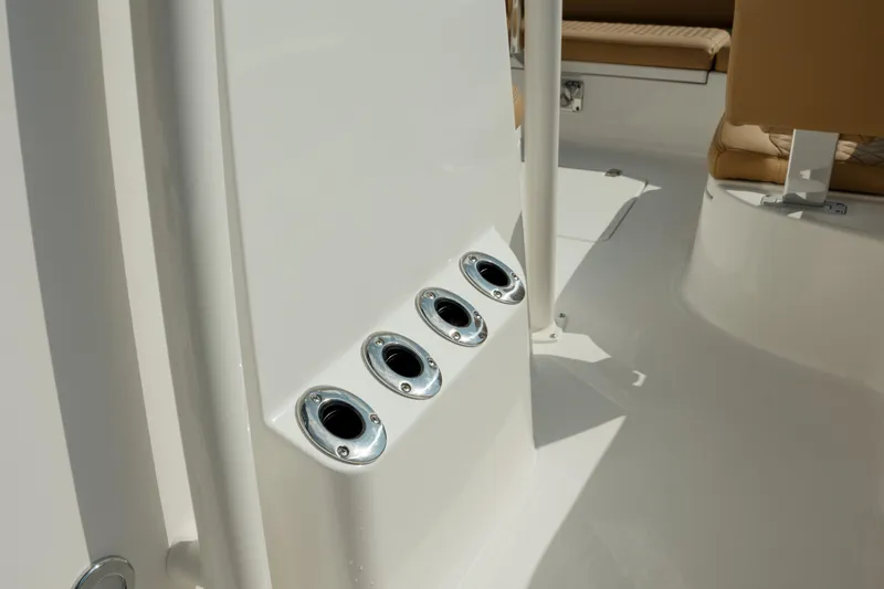  Yacht Photos Pics 2025 Caymas 26 HB boat interior with rod holders and seating.