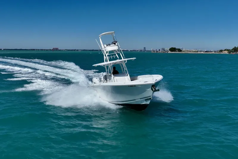 Yacht Photos Pics 2019 Jupiter 38 HFS boat cruising on clear blue water.