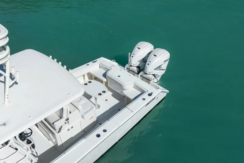  Yacht Photos Pics 2019 Jupiter 38 HFS boat with dual Yamaha engines on turquoise water.