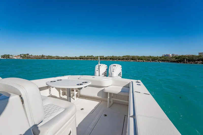  Yacht Photos Pics 2019 Jupiter 38 HFS boat on turquoise water with clear blue sky.