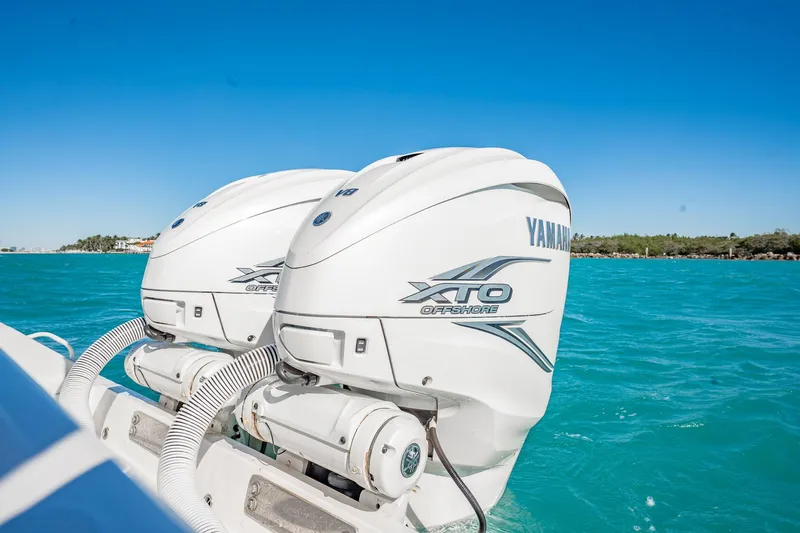  Yacht Photos Pics 2019 Jupiter 38 HFS boat with Yamaha XTO Offshore engines on turquoise water.