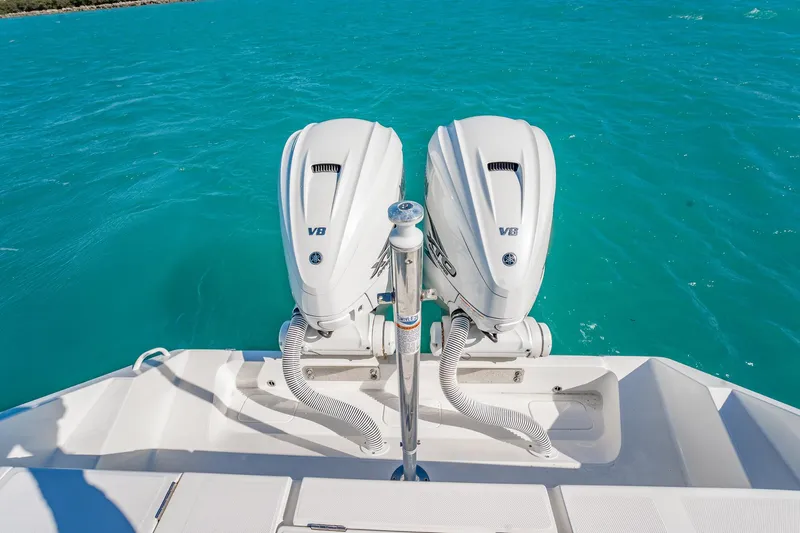  Yacht Photos Pics 2019 Jupiter 38 HFS boat with twin V8 engines on turquoise water.
