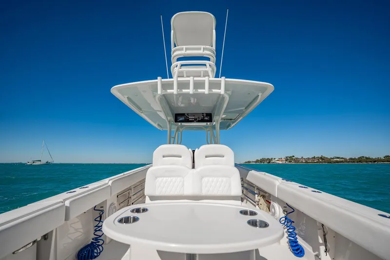  Yacht Photos Pics 2019 Jupiter 38 HFS boat on clear blue water under a sunny sky.