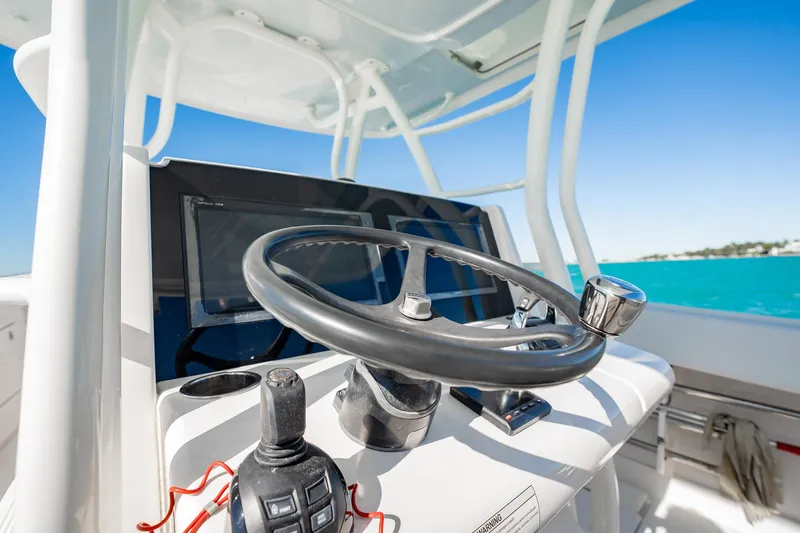  Yacht Photos Pics Steering console of 2019 Jupiter 38 HFS boat with ocean view.