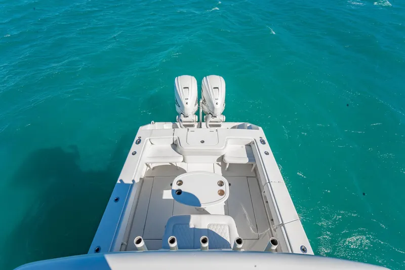  Yacht Photos Pics 2019 Jupiter 38 HFS boat with dual engines on turquoise water.