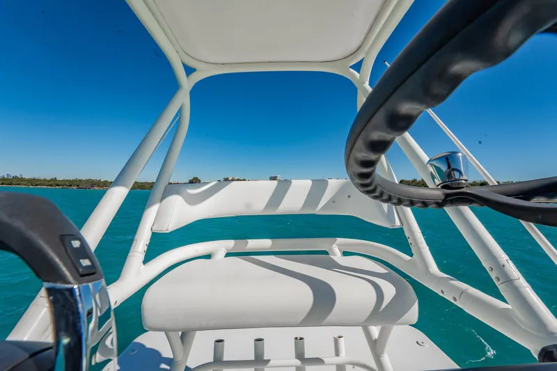  Yacht Photos Pics 2019 Jupiter 38 HFS boat helm with ocean view and clear blue sky.