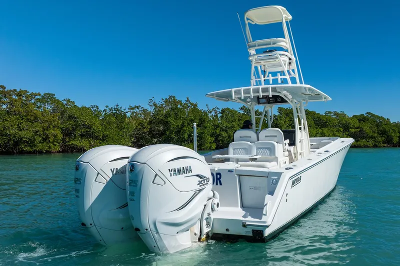  Yacht Photos Pics 2019 Jupiter 38 HFS boat with twin Yamaha engines on clear water.