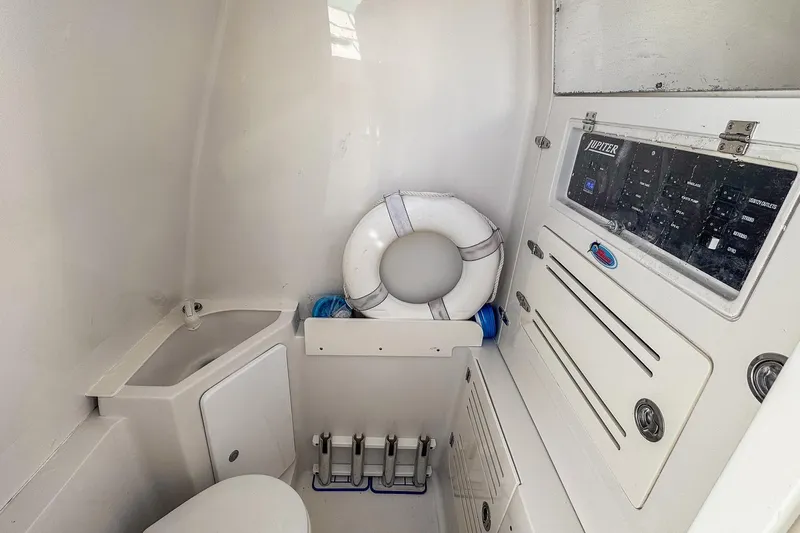  Yacht Photos Pics 2019 Jupiter 38 HFS boat interior with control panel, sink, and life preserver.