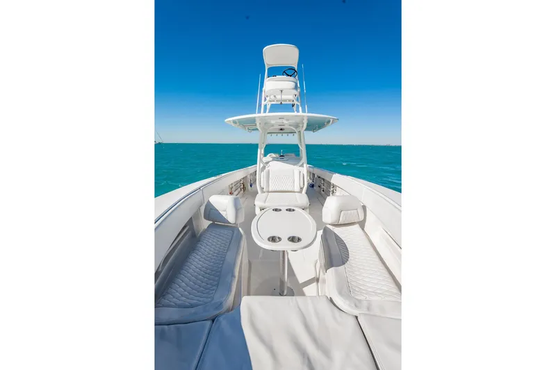  Yacht Photos Pics 2019 Jupiter 38 HFS boat with sleek design on open water, clear blue sky.