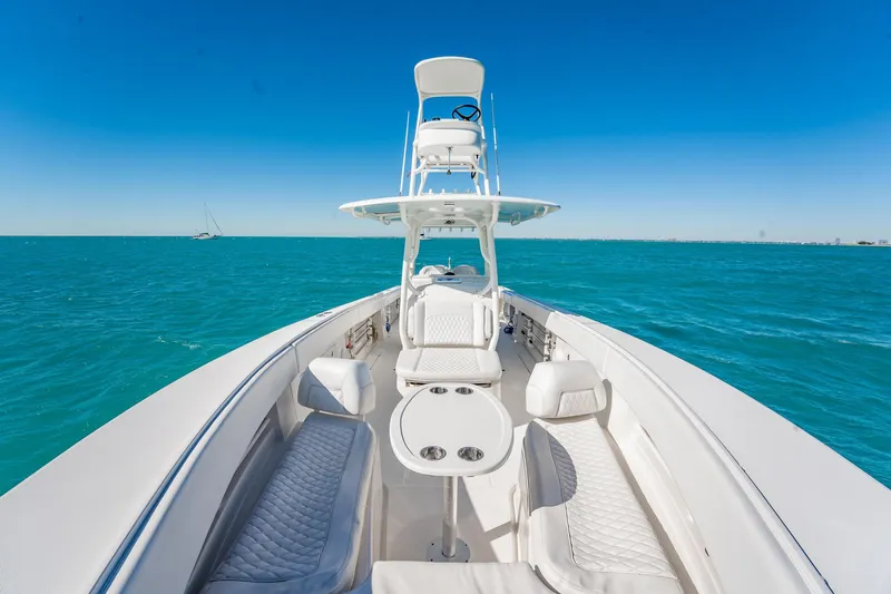  Yacht Photos Pics 2019 Jupiter 38 HFS boat on clear blue ocean under sunny sky.