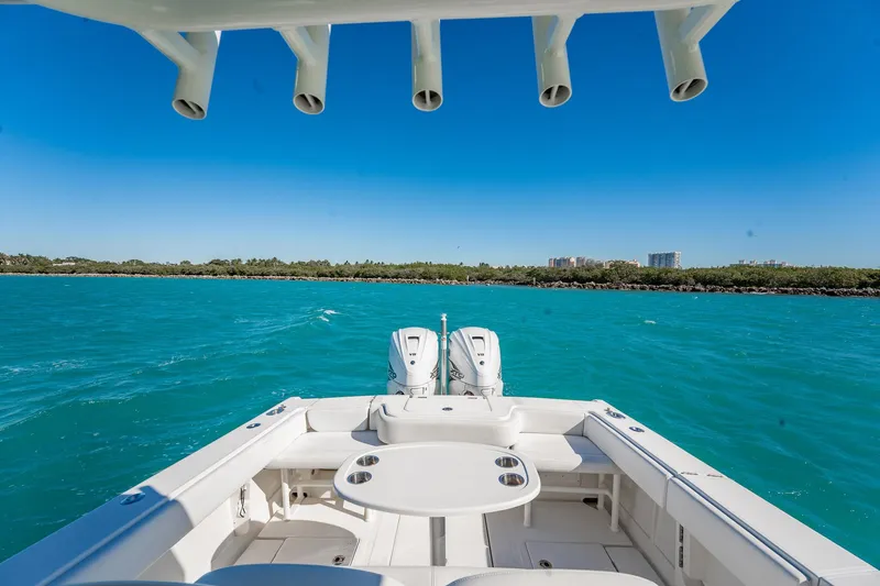  Yacht Photos Pics 2019 Jupiter 38 HFS boat on turquoise water with clear blue sky.