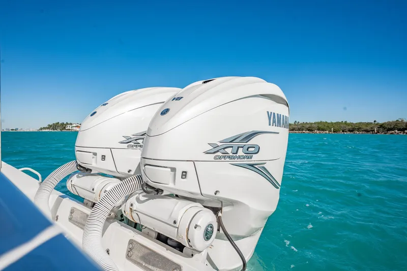  Yacht Photos Pics 2019 Jupiter 38 HFS boat with Yamaha XTO Offshore engines on turquoise water.