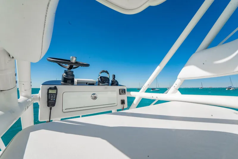  Yacht Photos Pics 2019 Jupiter 38 HFS boat helm with ocean view and clear blue sky.