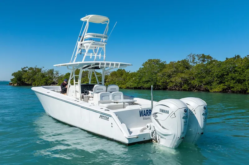  Yacht Photos Pics 2019 Jupiter 38 HFS boat with dual Yamaha engines on clear water.