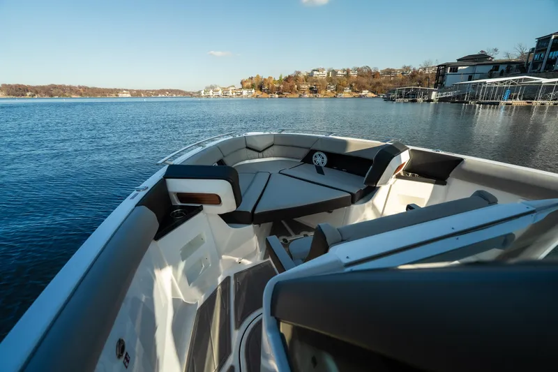  Yacht Photos Pics 2026 Monterey Elite 30 OB boat interior with lake view and modern seating.