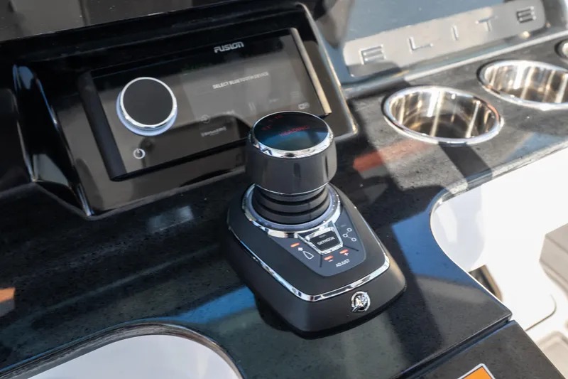  Yacht Photos Pics Control panel of 2026 Monterey Elite 30 OB boat with joystick and audio system.