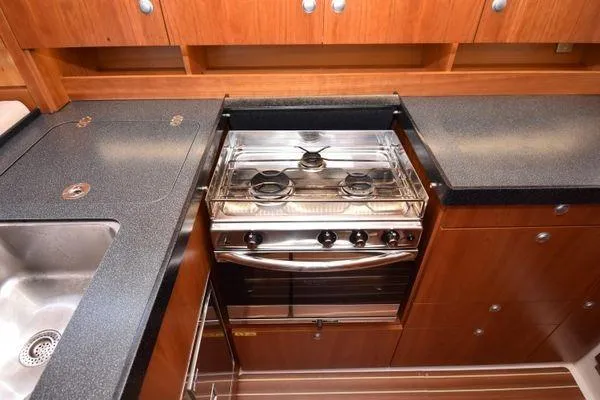 "jocale Ii" Yacht Photos Pics Modern kitchen in 2016 Hanse 455 yacht with stove and sink.