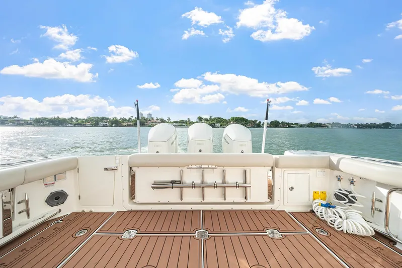  Yacht Photos Pics 2024 Boston Whaler 405 Conquest boat deck with scenic water view and clear skies.