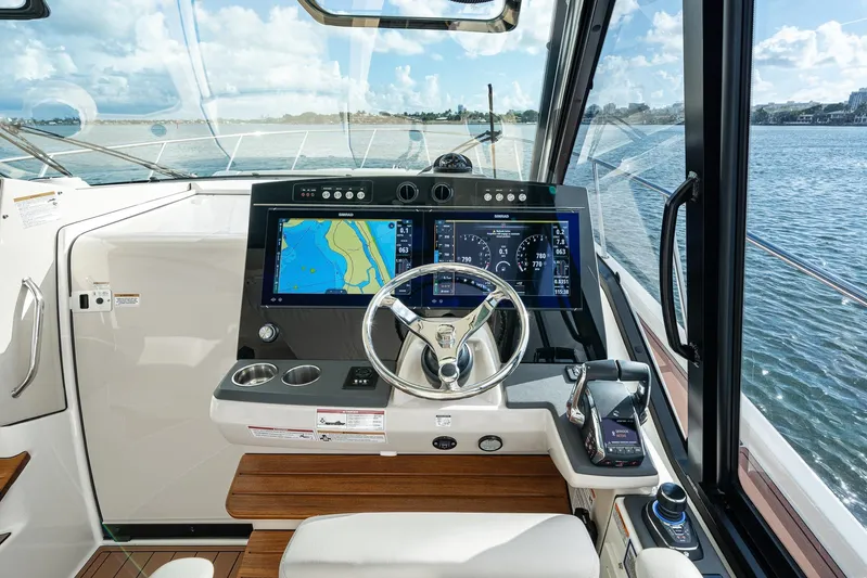  Yacht Photos Pics 2024 Boston Whaler 405 Conquest helm with advanced navigation displays and controls.