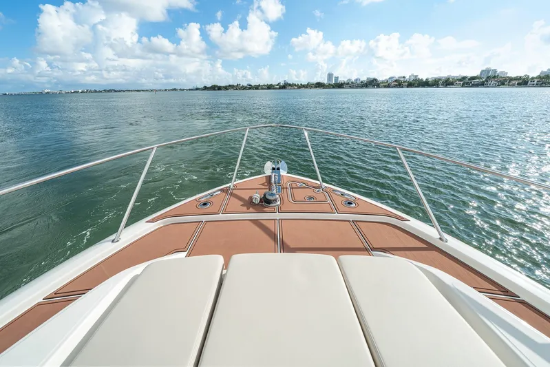  Yacht Photos Pics 2024 Boston Whaler 405 Conquest boat deck with ocean view and clear skies.