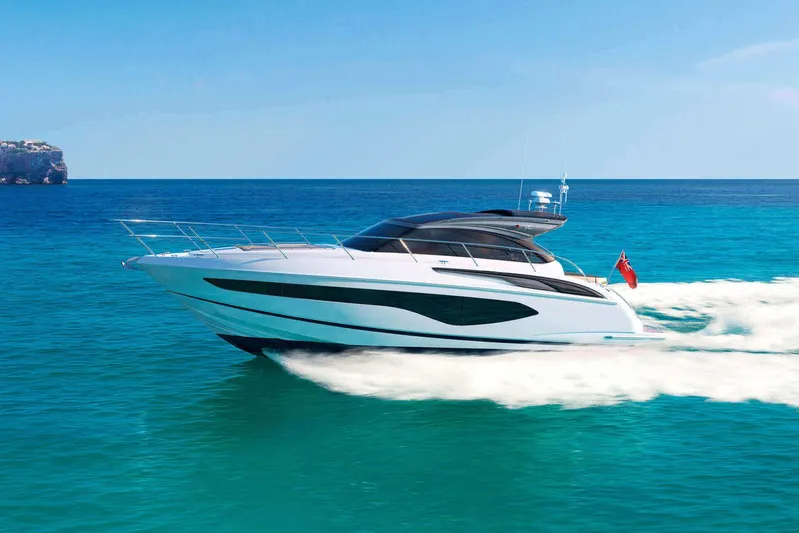  Yacht Photos Pics 2019 Princess V50 yacht cruising on clear blue ocean waters.