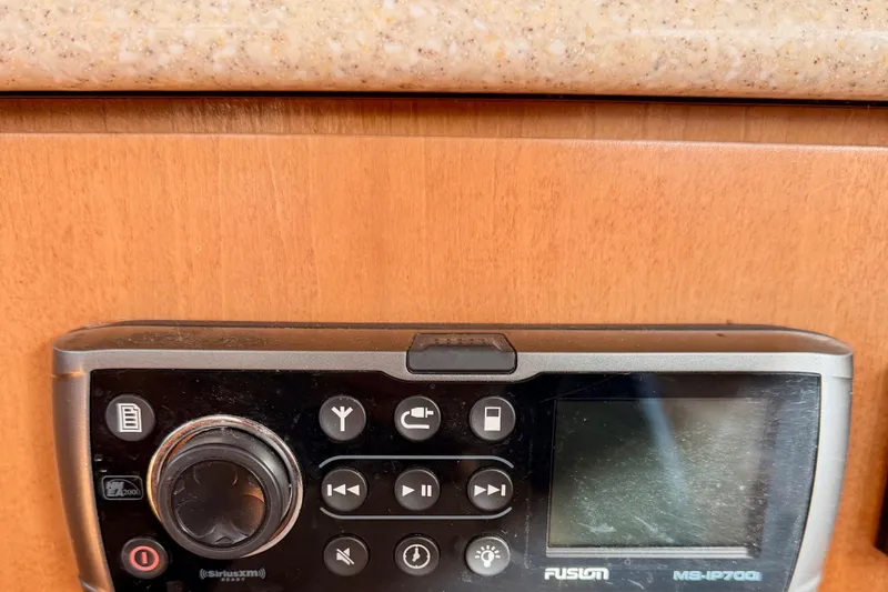  Yacht Photos Pics Fusion MS-IP700i stereo system on 2003 Meridian 341 Sedan yacht interior.