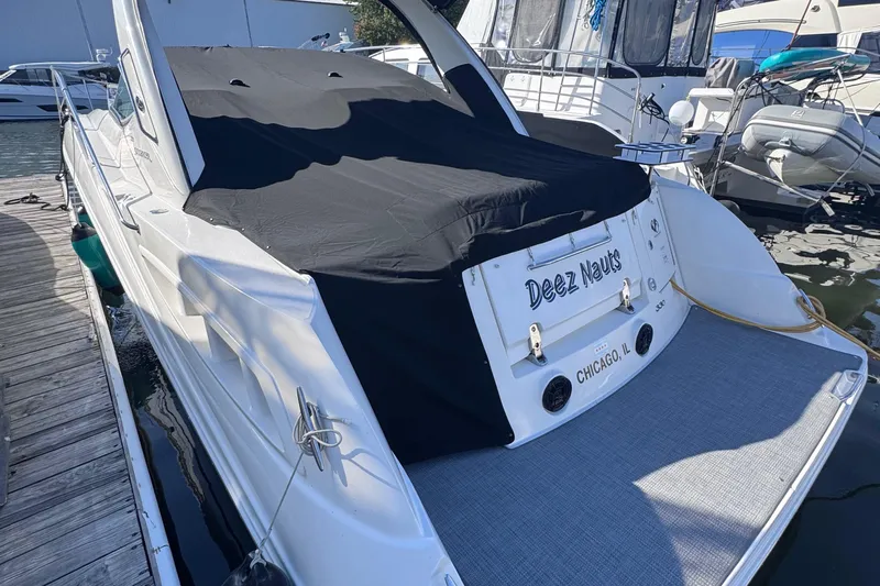  Yacht Photos Pics 2008 Sea Ray 350 Sundancer docked, covered, with "Deez Nauts" nameplate, Chicago.