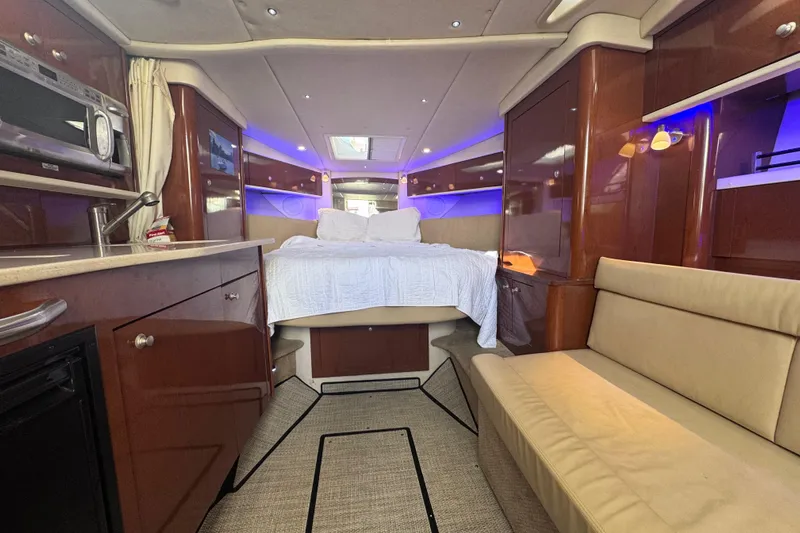  Yacht Photos Pics Luxurious interior of 2008 Sea Ray 350 Sundancer yacht with cozy seating and modern amenities.
